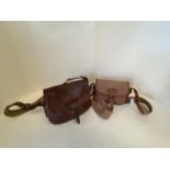 Leather cartridge bag & a canvas cartridge bag CONDITION: both well used, one keeper strap needs