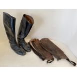 Pair of size 7 black leather hunting boots and pair of brown leather chaps CONDITION: both very worn