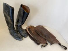 Pair of size 7 black leather hunting boots and pair of brown leather chaps CONDITION: both very worn