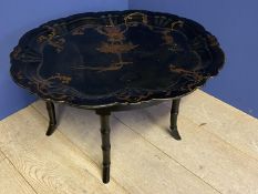 Regency style black lacquered papier mache large tray on stand. 79 x 66