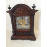 Victorian walnut cased German striking mantel clock, by Philip Hass Baden, silvered chapter ring