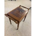 Piano stool on turned legs and brass casters with rising lid CONDITION: Some damage