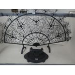 Fan shaped wrought iron fire screen and a cast iron boot scraper PURCHASERS: PAYMENT BY BANK