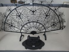 Fan shaped wrought iron fire screen and a cast iron boot scraper PURCHASERS: PAYMENT BY BANK