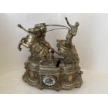 French Classical style brass chariot mantel clock 51cm L 51cm H with key