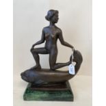 FREMIET Bronze figure of a nude mounted on a fish. Signature to base on green marble base. 36 H