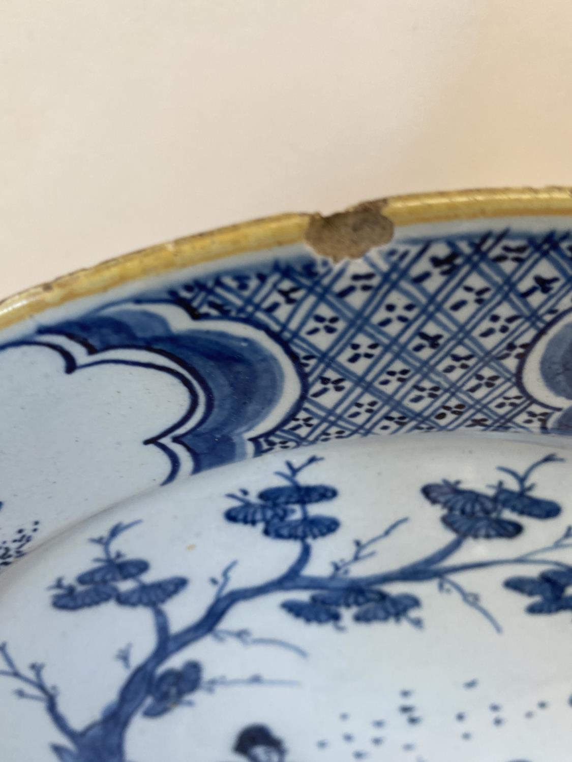 Tin glazed Delft plate 29cm diam, (rim chipped), Imari circular plate cracked and a florally - Image 7 of 8