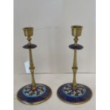 Pair of circular cloisonne champleve candle sticks 22cm H CONDITION: no visible signs of damage