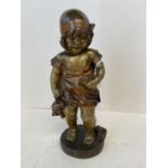 A bronze figurine of a girl holding a doll, signed JUAN Clara 21cm h. CONDITION: Good