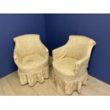 Pair of small tub chairs with loose covers in need of restoration