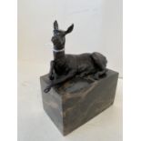 Cold painted figure of a recumbent deer on veined marble base, signed L Carvin 16cm H CONDITION: