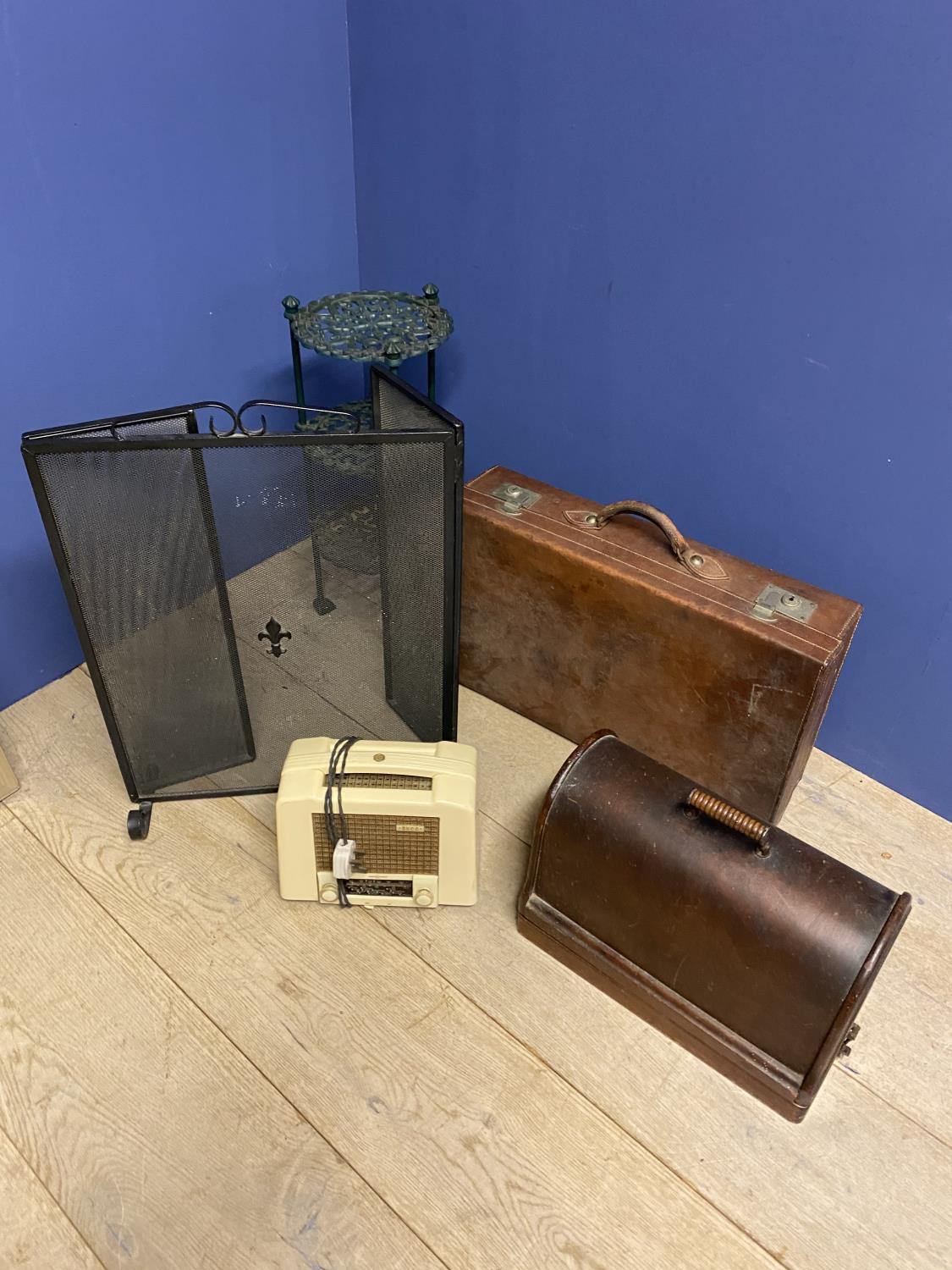 Leather suitcase, fire guard, vintage sewing machine, vintage radio Ekco, and three tier plant stand
