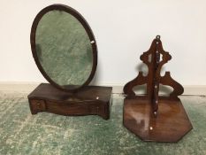 Mahogany wall-mounted clock support and Victorian dressing-table mirror supported by a three