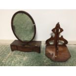 Mahogany wall-mounted clock support and Victorian dressing-table mirror supported by a three