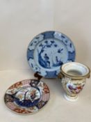 Tin glazed Delft plate 29cm diam, (rim chipped), Imari circular plate cracked and a florally