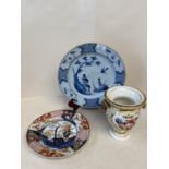 Tin glazed Delft plate 29cm diam, (rim chipped), Imari circular plate cracked and a florally