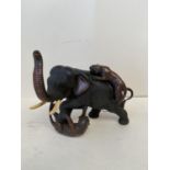 Japanese Bronze elephant being attacked by tigers. Seal mark to base 18cm H CONDITION: No visible