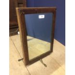 Edwardian mahogany toilet mirror and a Victorian adjustable shaving mirror on adjustable brass