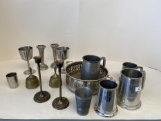 Quantity of Pewter and other tankards, tot thimbles, beakers, candlesticks, brass bells etc