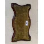 Old brass serpentine shaped Cribbage board 27cm L CONDITION: General wear
