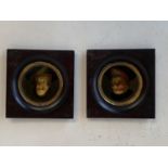 Pair of circular miniatures of continental gentleman in wooden frames