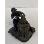 Asian miniature bronze figure group of a seated man and his barber 6.5cm H CONDITION: No visible