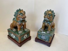 Pair of Dogs of Fo on stands CONDITION: general wear, no sign of damage