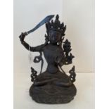 Chinese Bronze figure of seated Budha. CONDITION: General wear