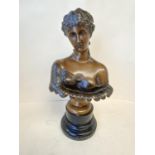 A.G.SCHAEFFER & WALCKER BERLIN. Bronze bust of a lady on a circular wooden base. 40cm H CONDITION: