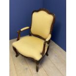 C19th upholstered show frame elbow chair upholstered in yellow fabric