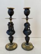 Pair of classic style Bronze an ormolu candle sticks 25H CONDITION: No visible signs of damage,
