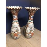 A fine pair of large C19th Japanese Arita vases, with crimped flaring necks, decorated with birds