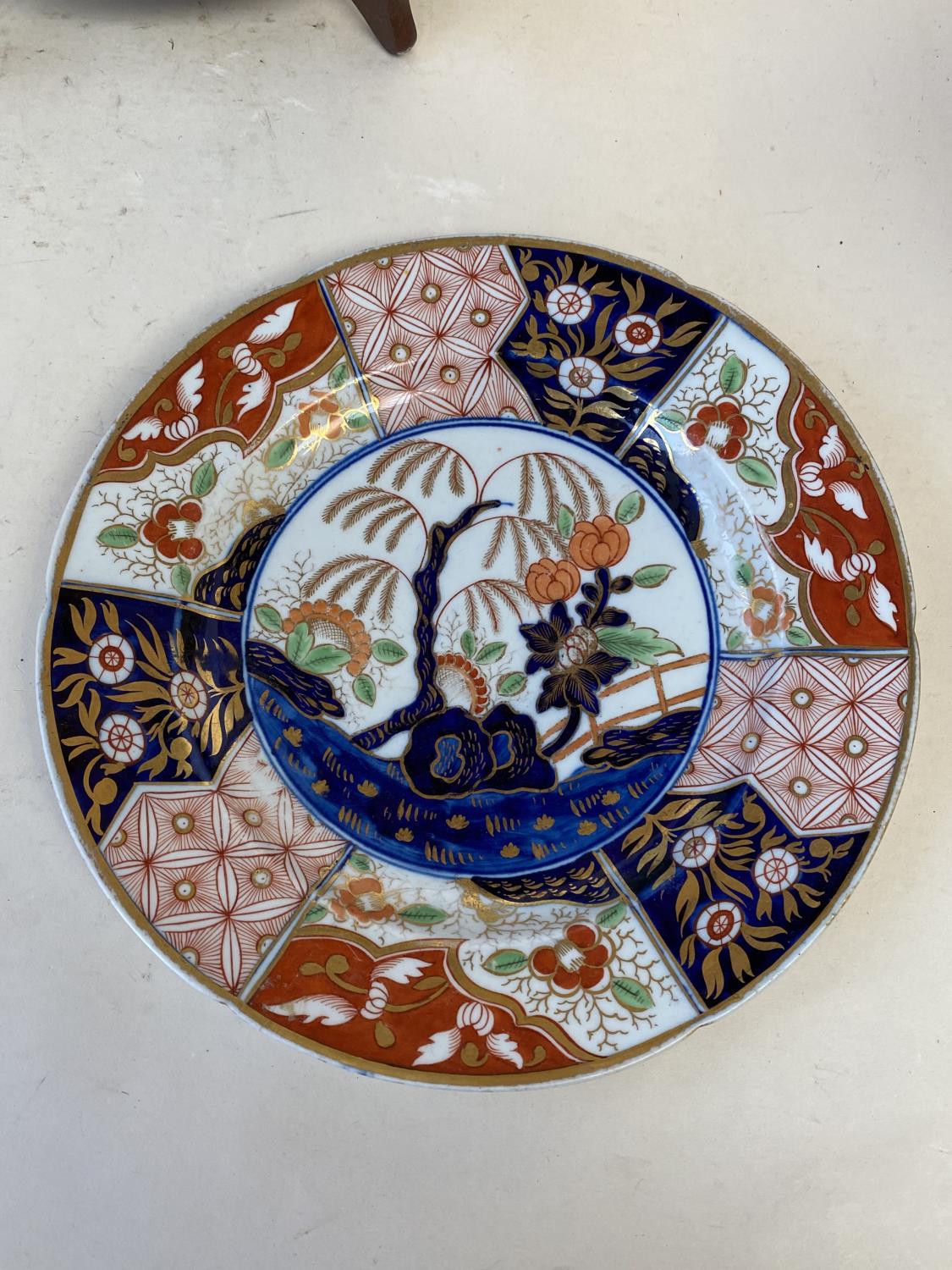 Tin glazed Delft plate 29cm diam, (rim chipped), Imari circular plate cracked and a florally - Image 4 of 8