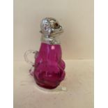 Contemporary cranberry coloured glass decanter with hinged lid in the form of a monkey 20cmH