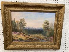 Landscape painting in gilt frame