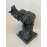 Contemporary verdigrated bronze polar bear on a stump with black marble stand. 21cm sq 38cm H