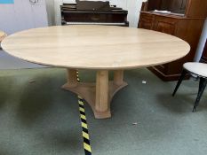 Good quality light oak circular dining table on triform base 190 dia