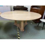 Good quality light oak circular dining table on triform base 190 dia