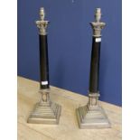 Pair of classical Adam style Corinthium column and marble style lamp stands, on stepped base