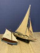 Two models of sailing boats, the larger is 66cmL, general wear