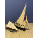 Two models of sailing boats, the larger is 66cmL, general wear