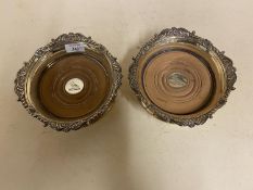 Pair of heavy silver plate wine magnum size table coasters, with gadrooned and shell borders and