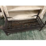 Ornate heavy iron fire grate , widest point 91cm, and depth front to back 38cm, and the height ,