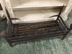 Ornate heavy iron fire grate , widest point 91cm, and depth front to back 38cm, and the height ,