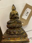 Oriental bronze Buddha statue 14th century with inlaid semi-precious stones. Character marks to