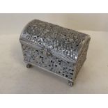 Good quality white metal pierced oblong casket with hinged dome lid on 4 claw fee 8.8 ozt (