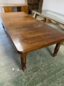 Mid Victorian mahogany dining table with 2 extra leaves