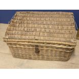 Old wicker laundry basket, worn