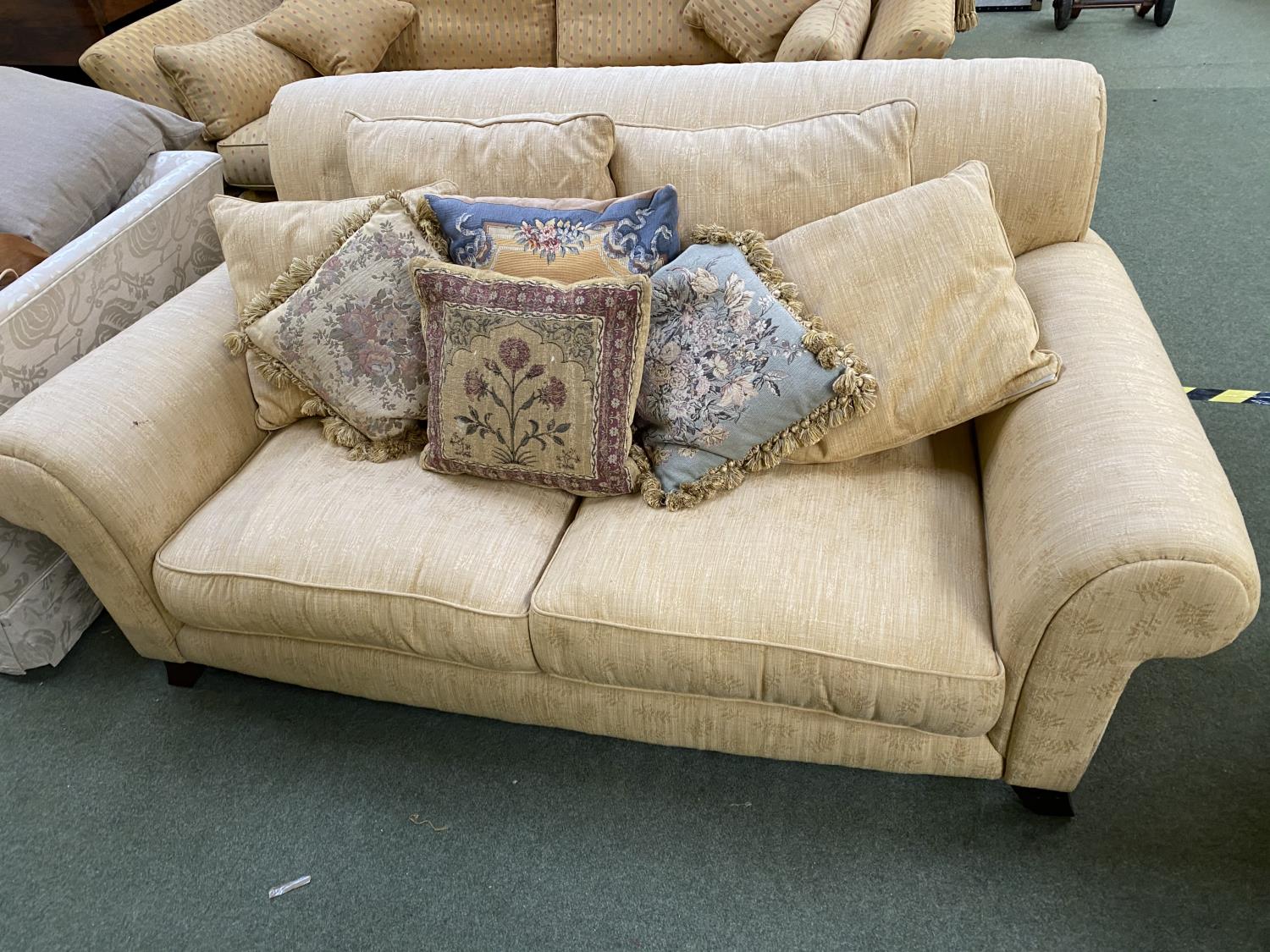 Good quality sofa, upholstered in gold coloured fabric , with good quality tapestry cushions