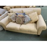 Good quality sofa, upholstered in gold coloured fabric , with good quality tapestry cushions